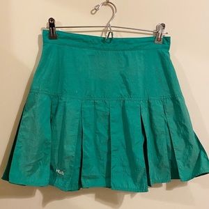 Green pleated tennis skirt